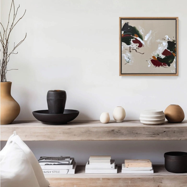 A small neutral artwork by Lee J Morgan Art displayed on a living room wall